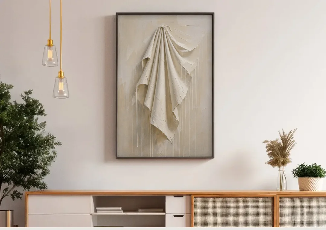 3D White Wall Art of Draped Plaster Cloth canvas wall art above a wooden sideboard under pendant lights