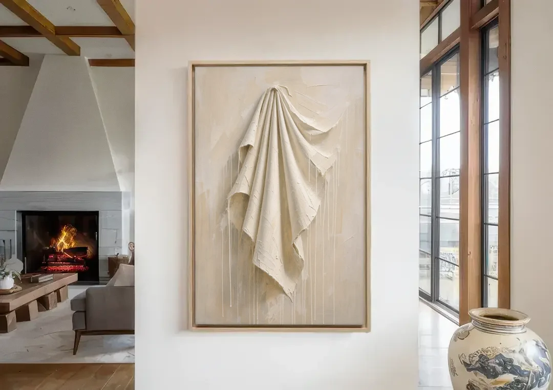 3D White Wall Art of Draped Plaster Cloth canvas wall art in a living room with a fireplace