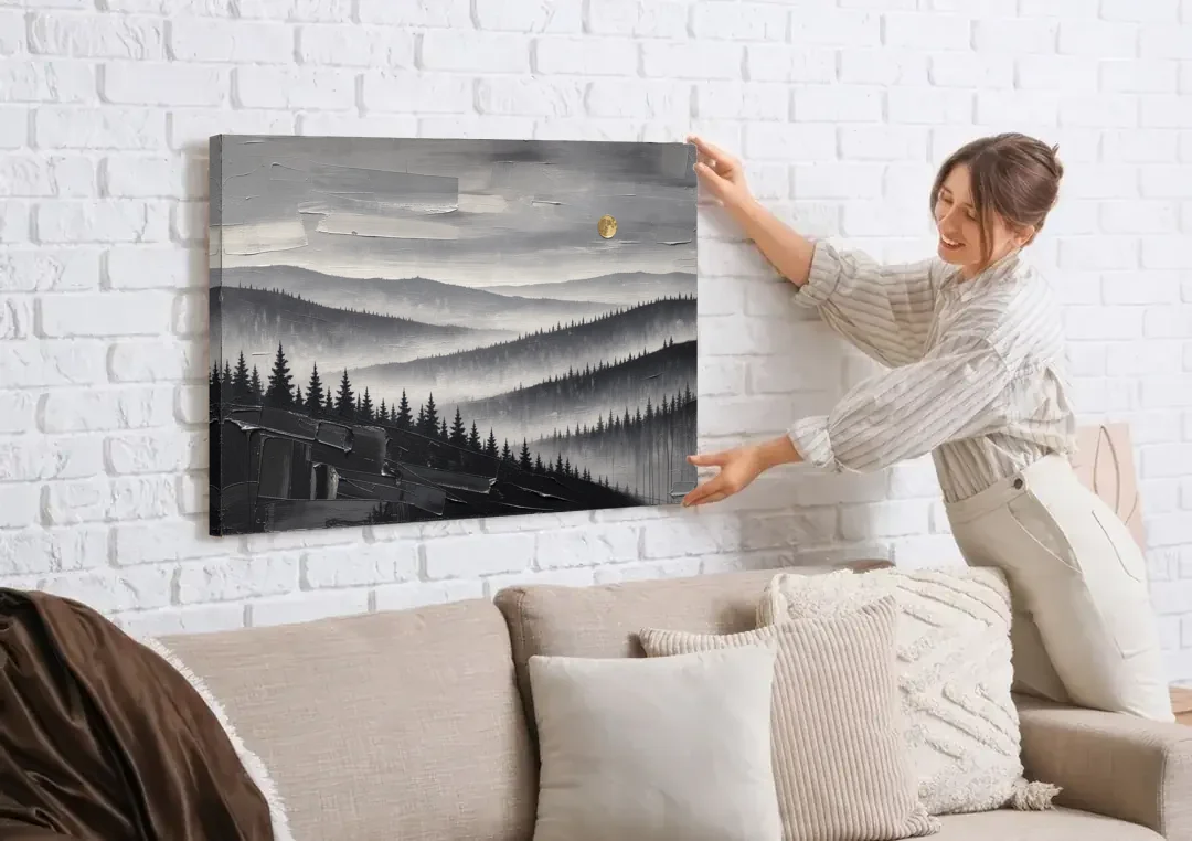 Above Bed Wall Art of Misty Pine Ridges canvas wall art being hung on a white brick wall above a sofa