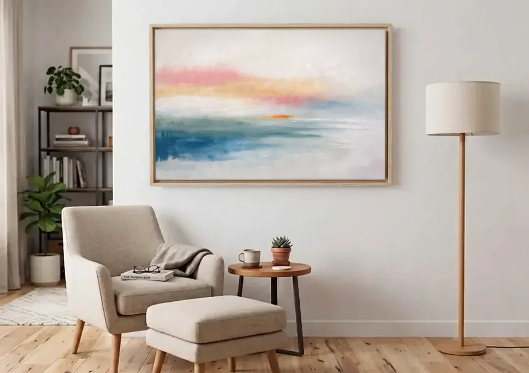 Abstract Art Above Bed with Tangerine Haze canvas wall art above an armchair in a bright living room