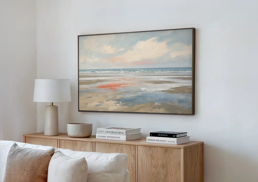 Abstract Beach Wall Art of Coral Tidal Flats canvas wall art above a wooden sideboard next to a sofa