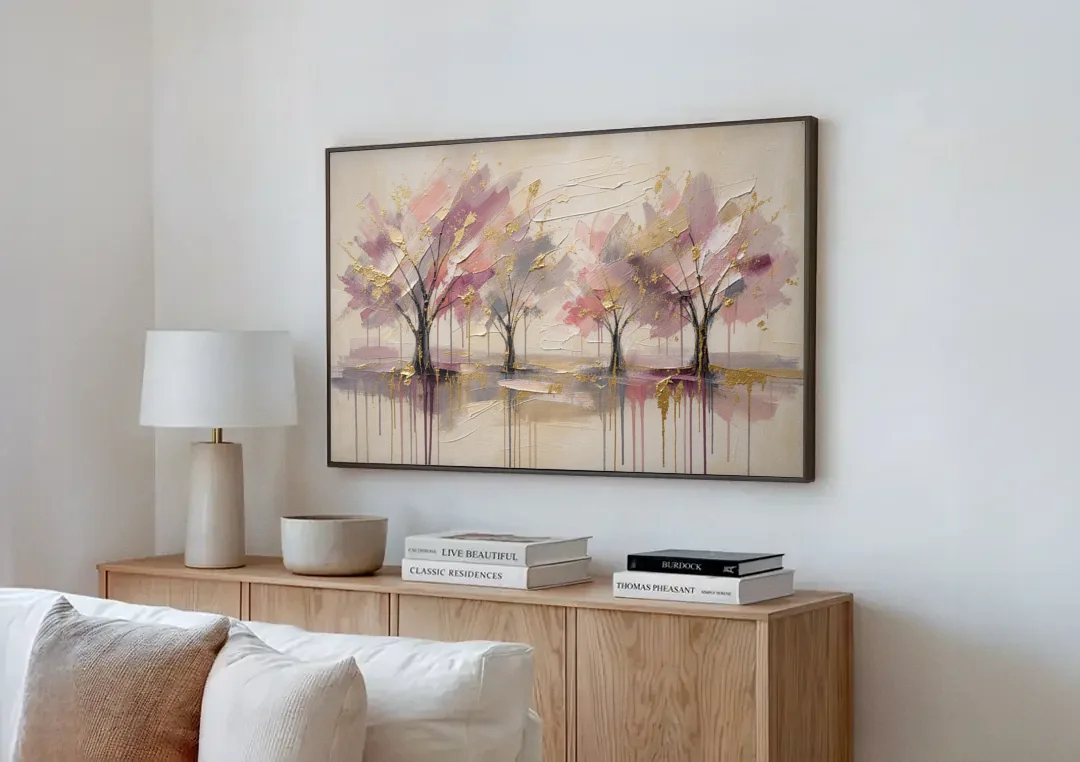 Abstract Cherry Blossom Painting with Gold Drips canvas wall art above a wooden sideboard next to a sofa