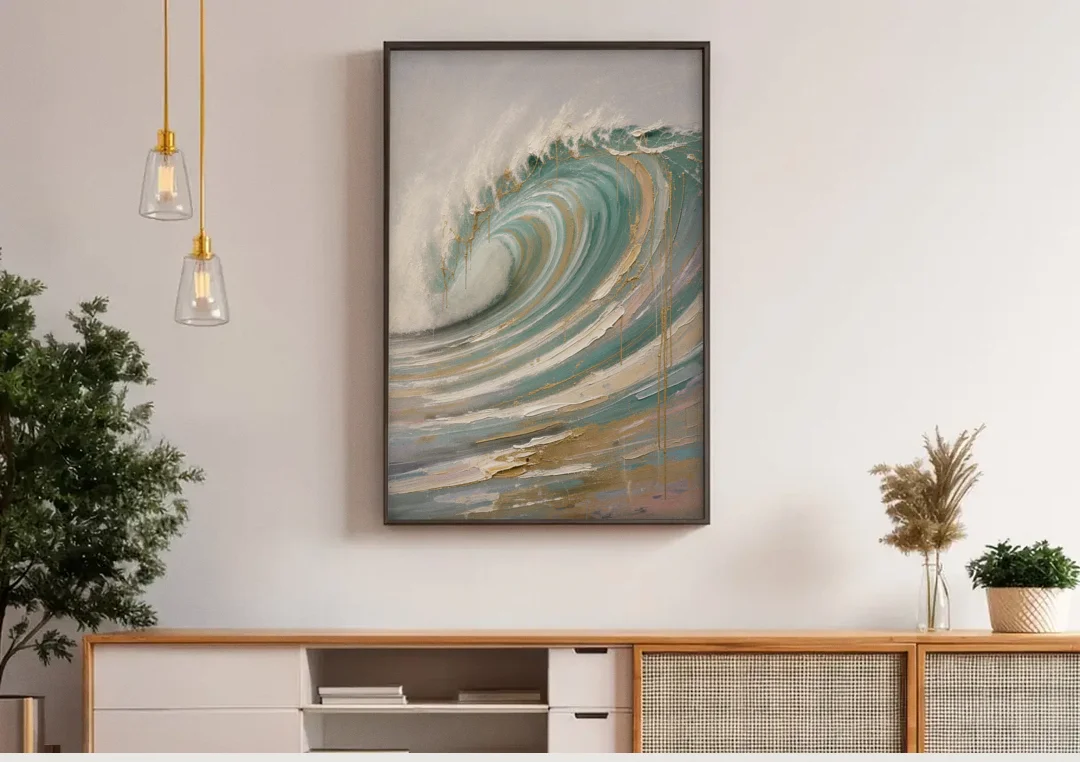 Abstract Coastal Wall Art of a Gilded Curling Wave canvas wall art above a wooden sideboard under pendant lights