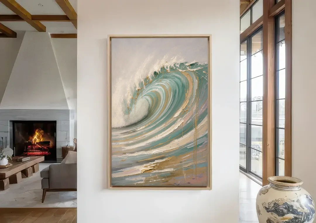 Abstract Coastal Wall Art of a Gilded Curling Wave canvas wall art in a living room with a fireplace