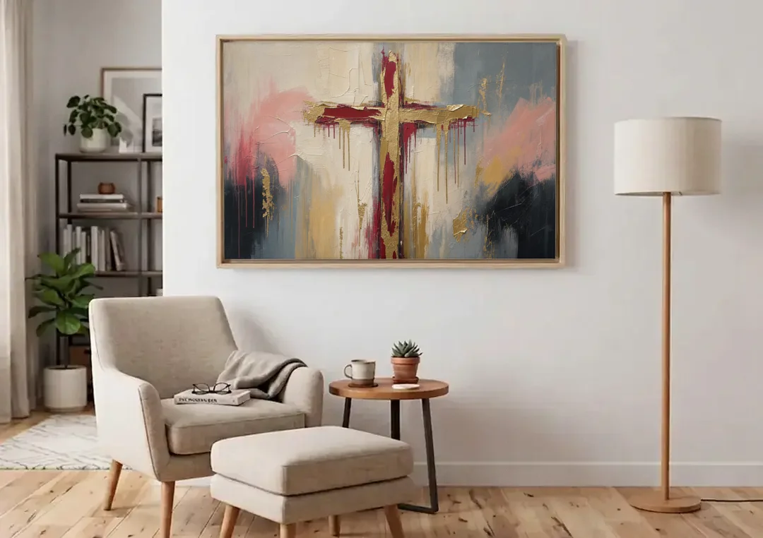Abstract Cross Painting in Crimson and Gold Leaf canvas wall art above an armchair in a bright living room