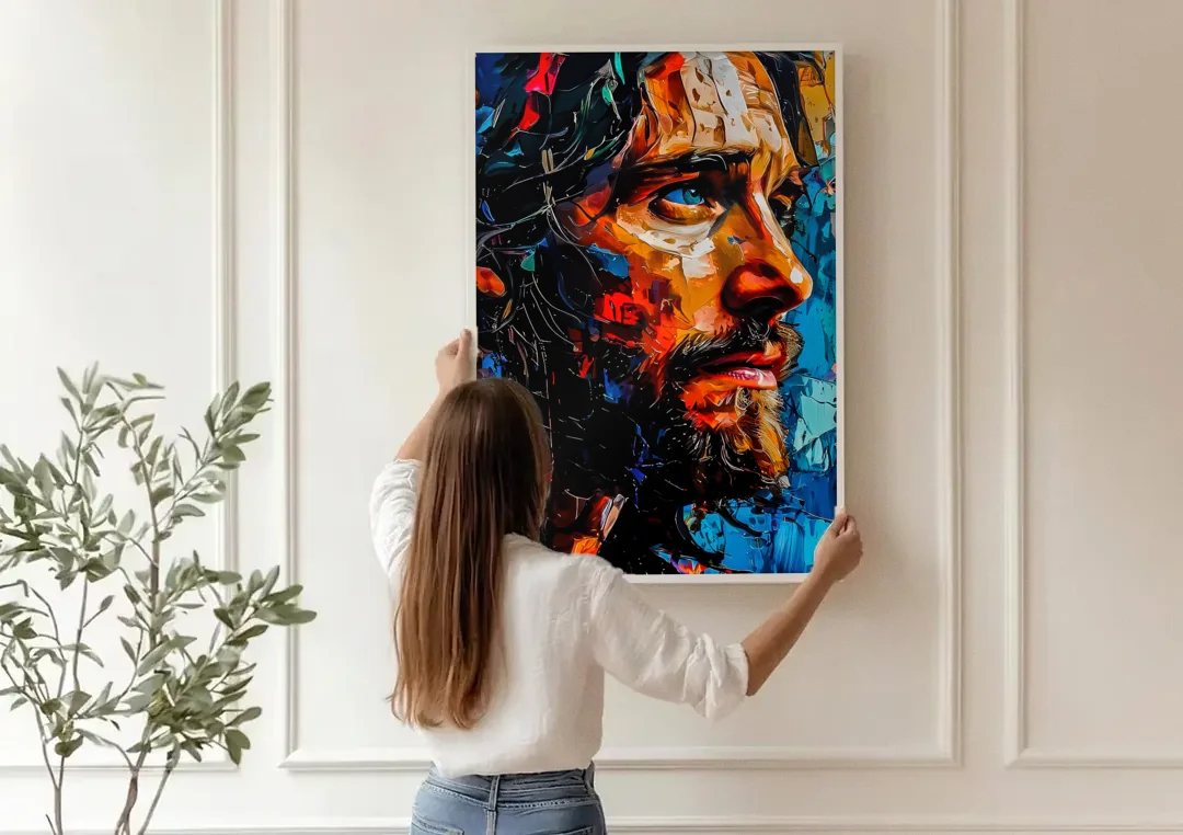 Abstract Jesus Portrait canvas wall art being hung on a paneled wall