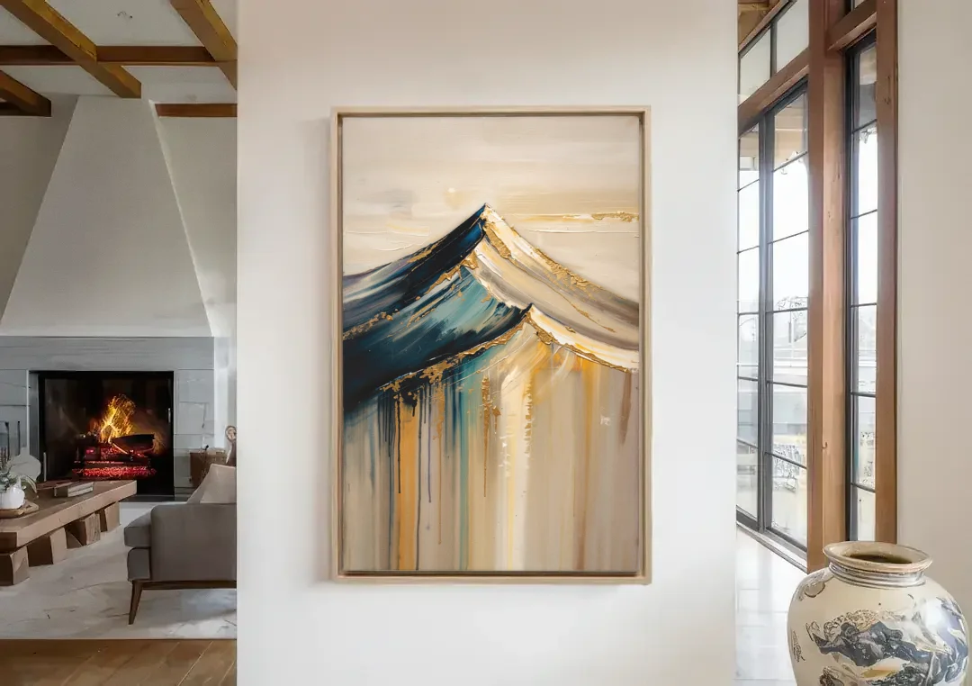 Abstract Mountain Painting with Gold Ridgelines canvas wall art in a living room with a fireplace