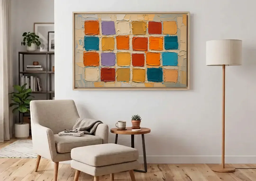 Abstract Orange Knife Tile Grid canvas wall art above an armchair in a bright living room
