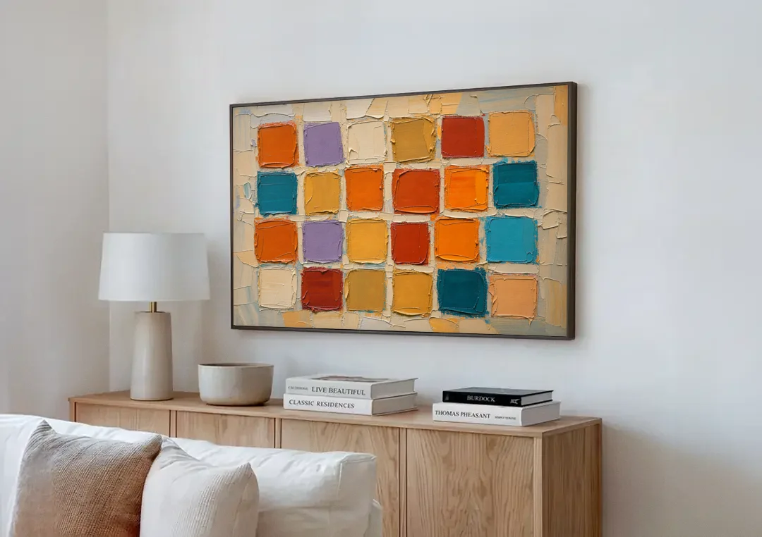 Abstract Orange Knife Tile Grid canvas wall art above a wooden sideboard next to a sofa