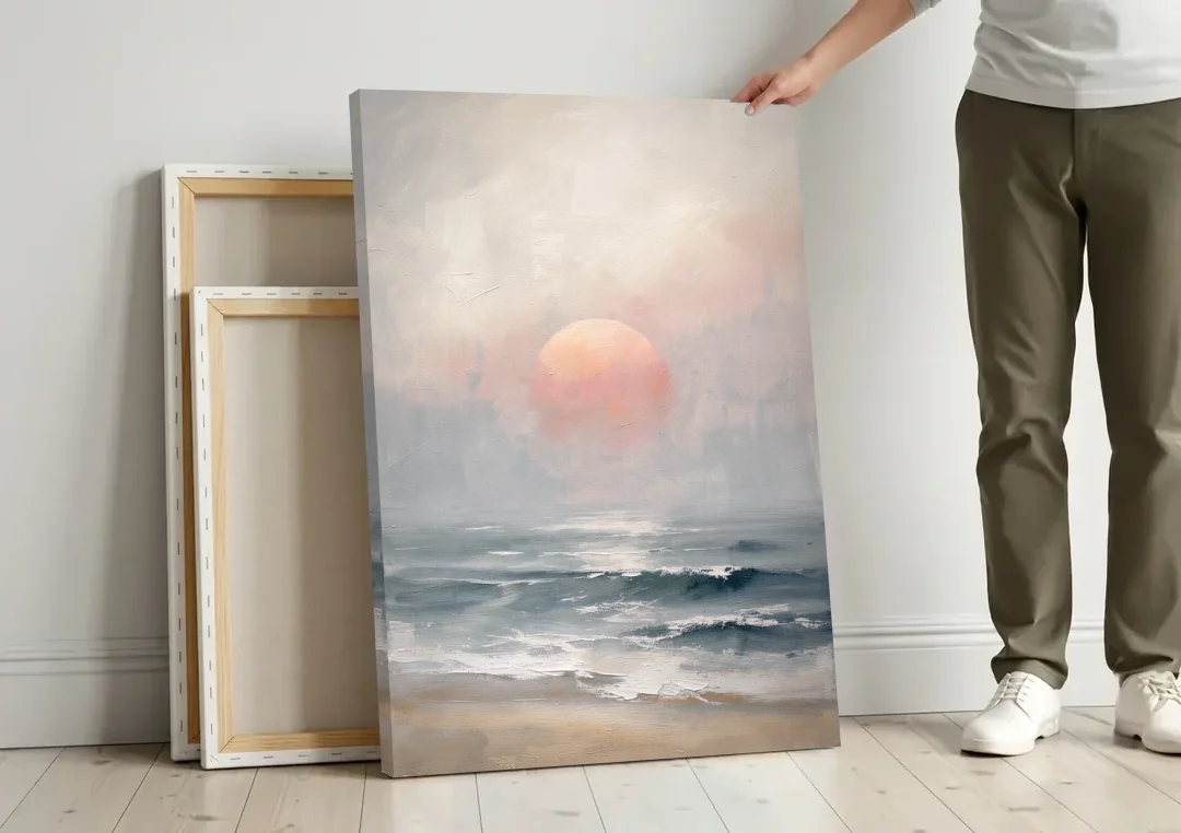 Abstract Pink Sun Through Sea Mist for the Bedroom canvas wall art leaning against a wall next to blank canvases