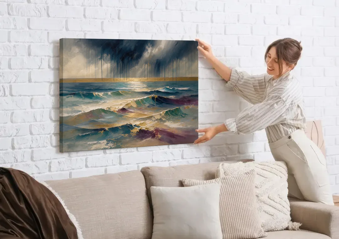 Abstract Seascape Painting with Gold Horizon canvas wall art being hung on a white brick wall above a sofa