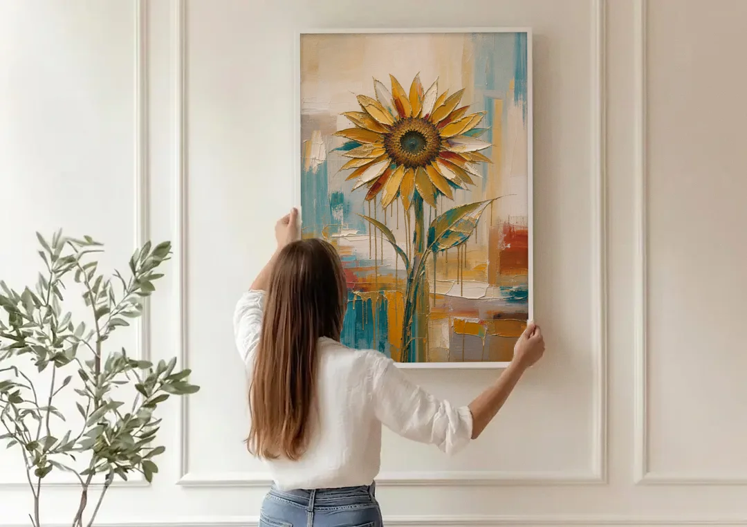 Abstract Sunflower Painting With Gold Drips canvas wall art being hung on a paneled wall