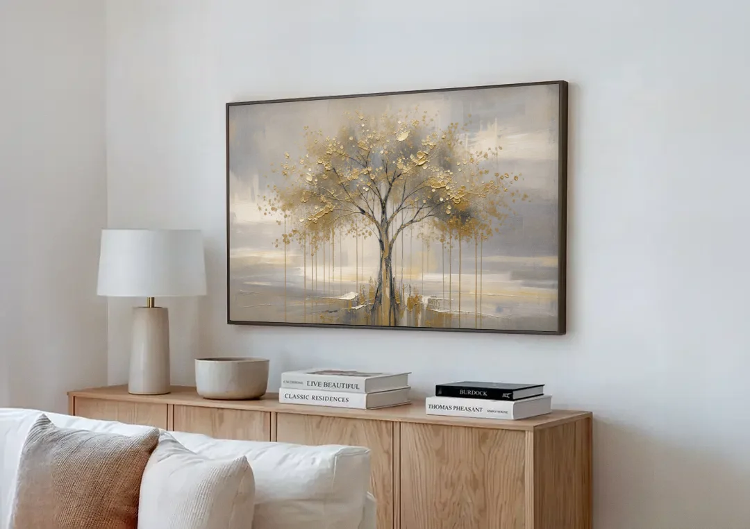 Abstract Tree Painting in Gold Leaf and Cream canvas wall art above a wooden sideboard next to a sofa