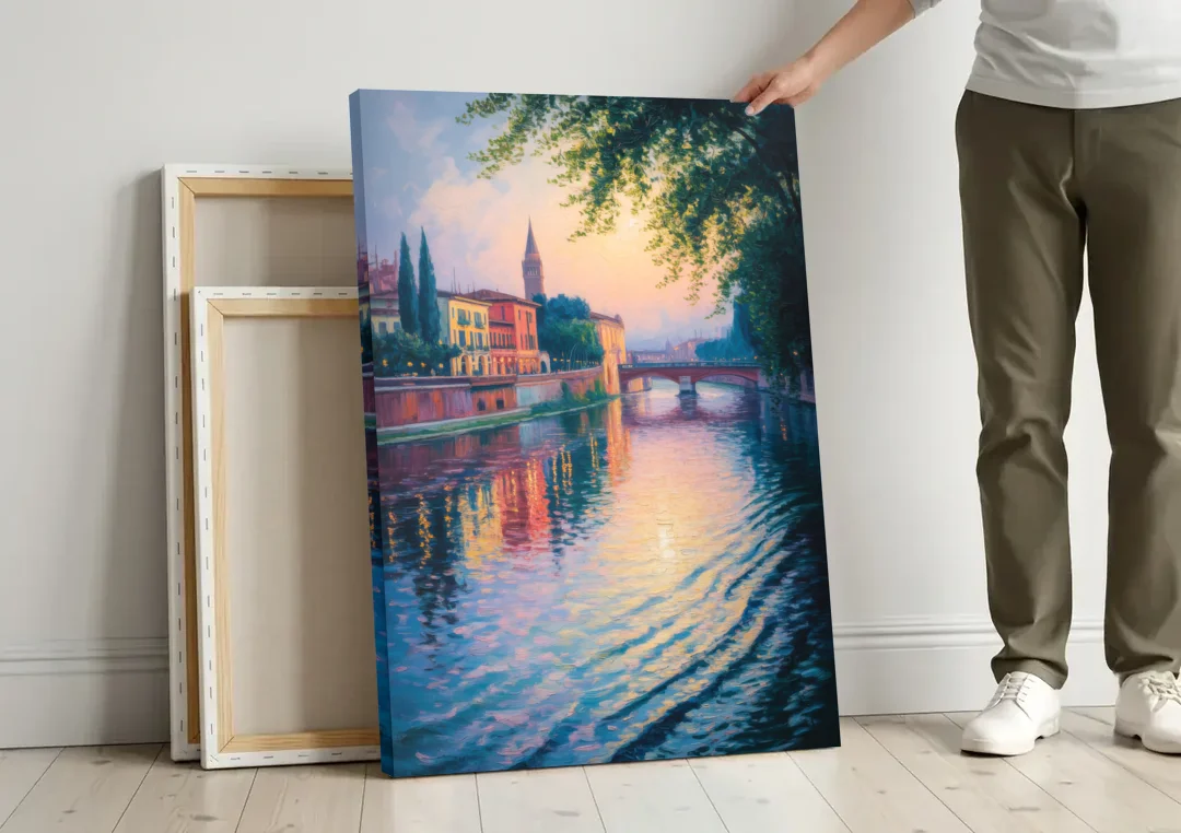 Adige River Reflections canvas wall art leaning against a wall next to blank canvases