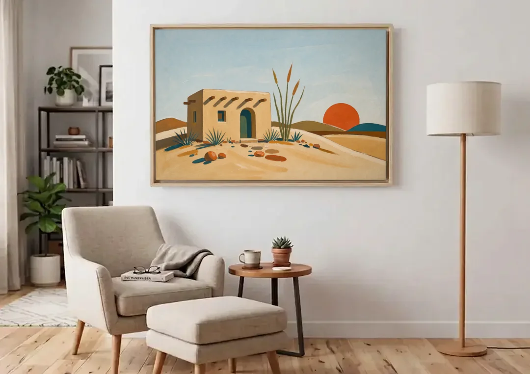 Adobe House Painting at Desert Sundown canvas wall art above an armchair in a bright living room