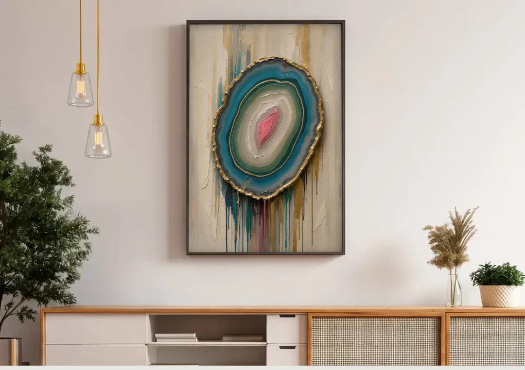 Agate Slice with Gold Rim and Teal Drips canvas wall art above a wooden sideboard under pendant lights