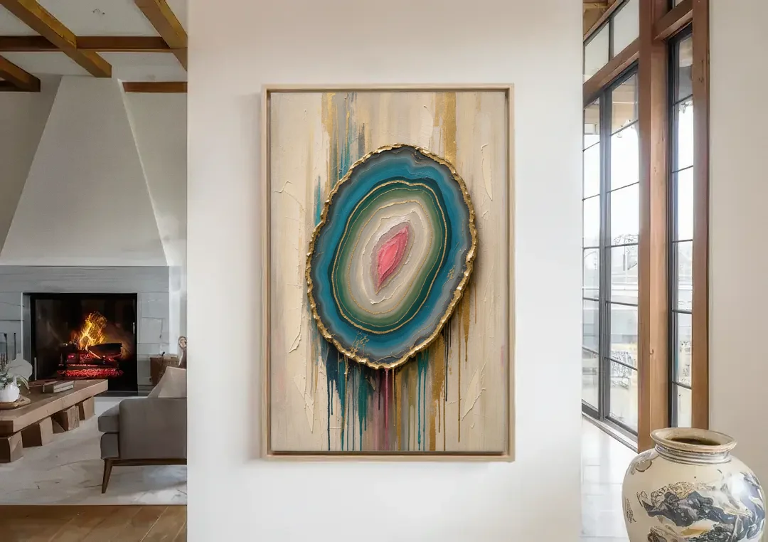 Agate Slice with Gold Rim and Teal Drips canvas wall art in a living room with a fireplace