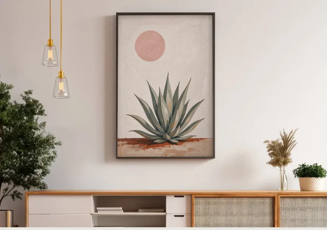 Agave Rosette Under a Blush Pink Sun canvas wall art above a wooden sideboard under pendant lights