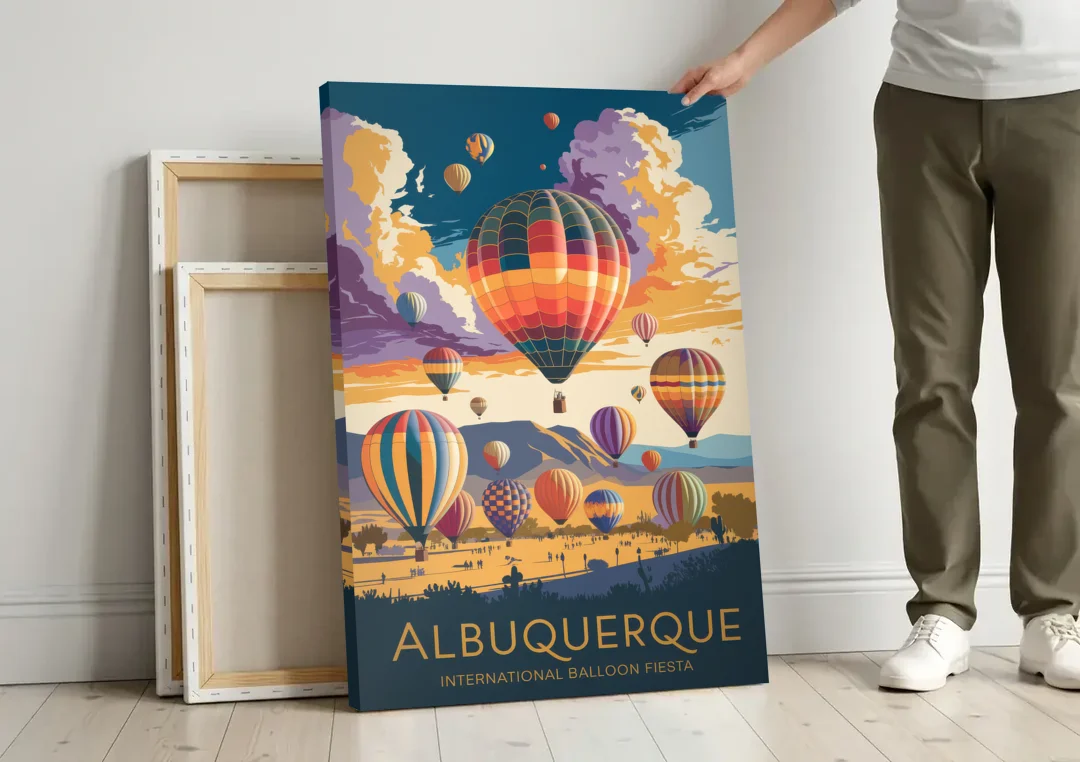Albuquerque Balloon Fiesta canvas wall art leaning against a wall next to blank canvases