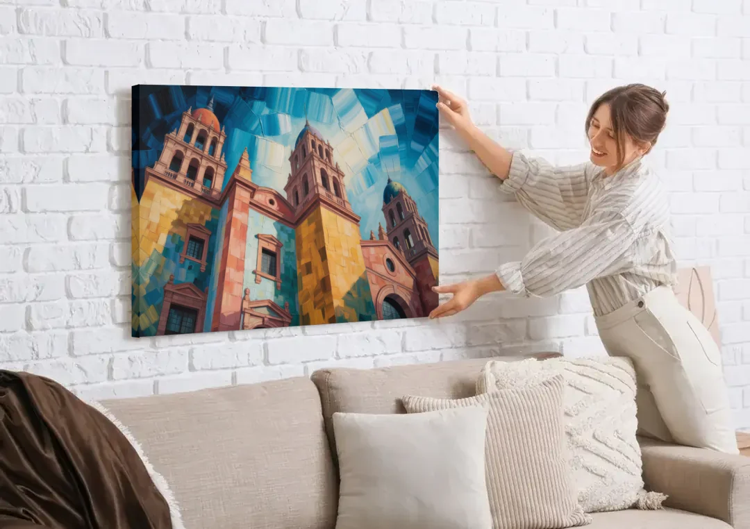 Alhóndiga de Granaditas canvas wall art being hung on a white brick wall above a sofa