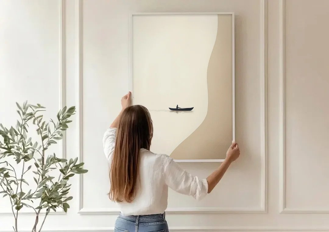 Alone with the Water canvas wall art being hung on a paneled wall