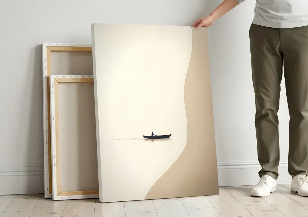 Alone with the Water canvas wall art leaning against a wall next to blank canvases