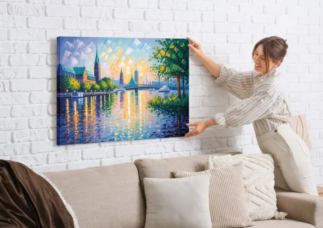 Alster Serenity canvas wall art being hung on a white brick wall above a sofa