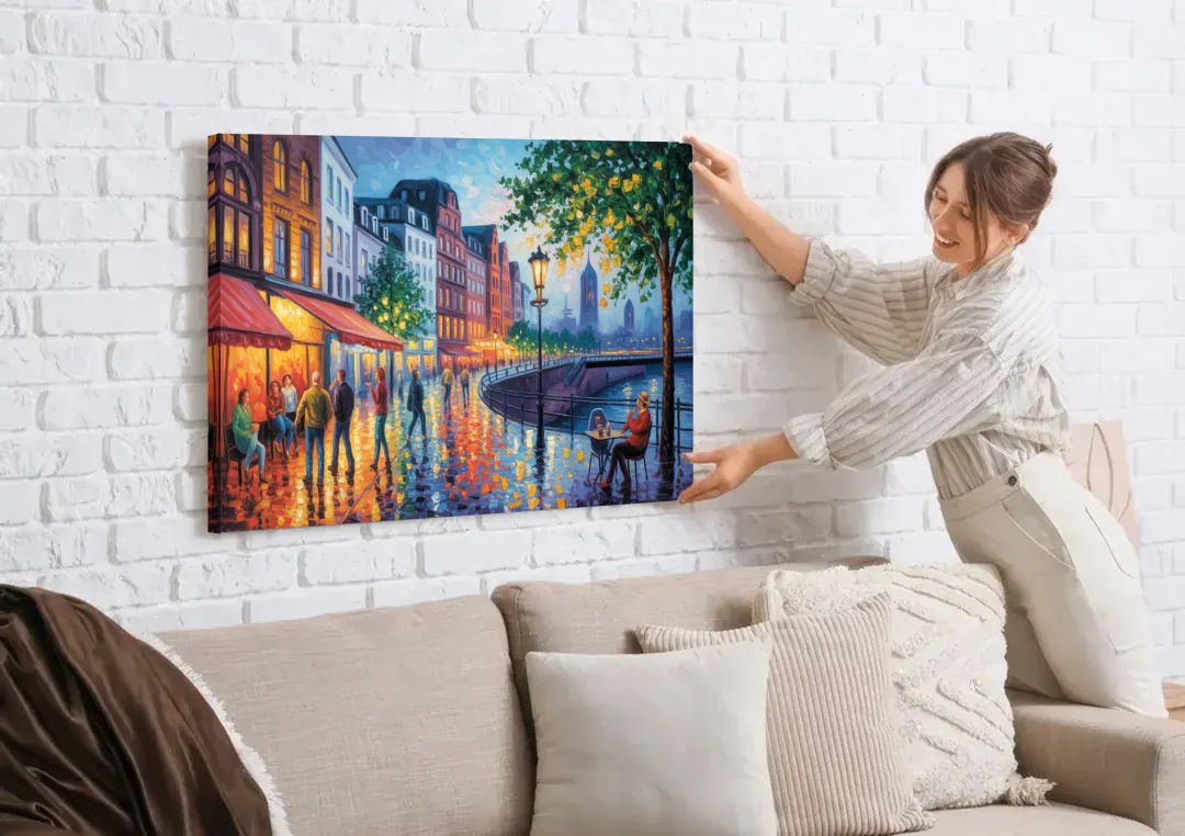 Altstadt Charm canvas wall art being hung on a white brick wall above a sofa
