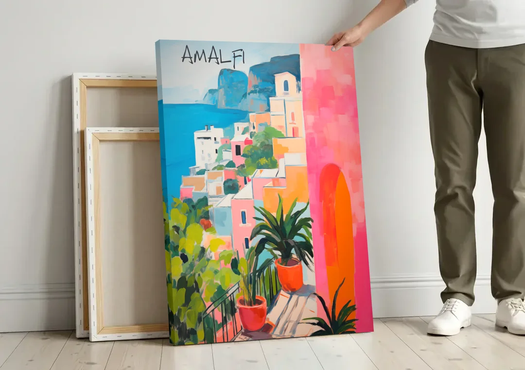 Amalfi Art with a Pink Arch canvas wall art leaning against a wall next to blank canvases