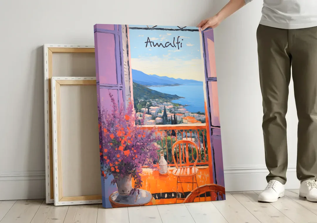 Amalfi Coast Art Through a Window canvas wall art leaning against a wall next to blank canvases