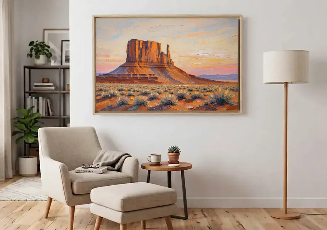 American Landscape Painting of a Desert Mesa canvas wall art above an armchair in a bright living room