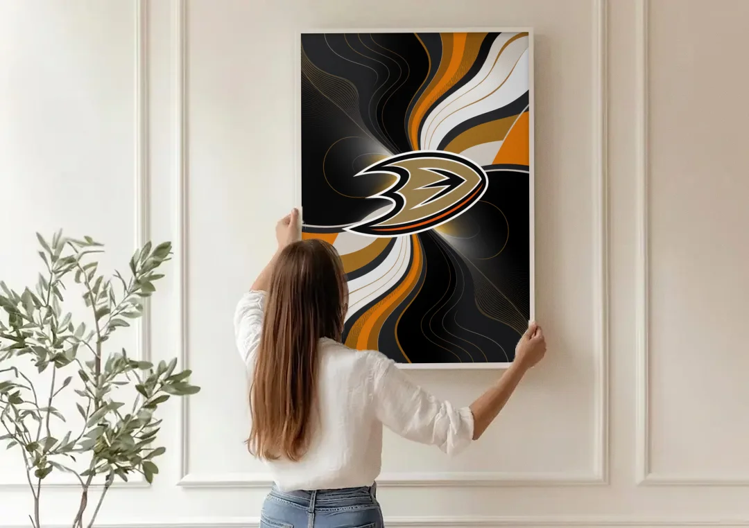 Anaheim Ducks Pride canvas wall art being hung on a paneled wall