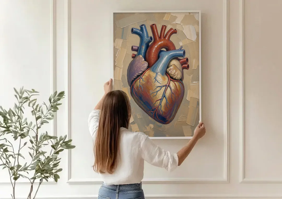 Anatomical Heart Painting in Blue and Gold canvas wall art being hung on a paneled wall
