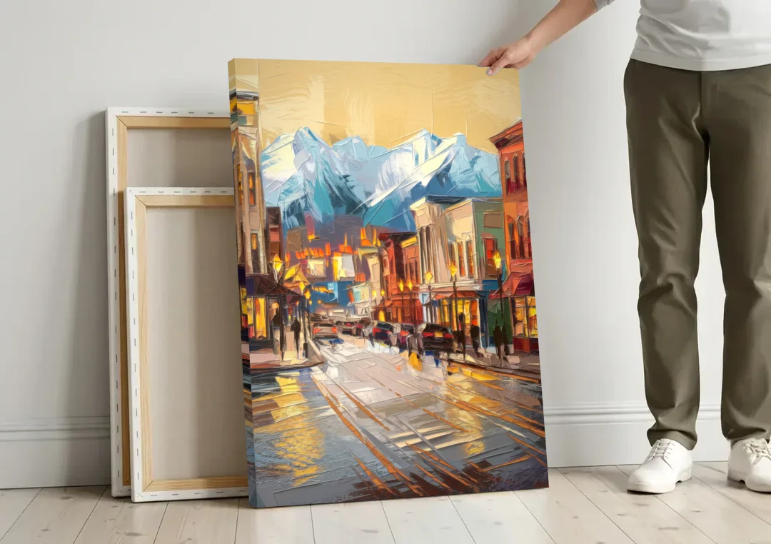 Anchorage Downtown Streets canvas wall art leaning against a wall next to blank canvases