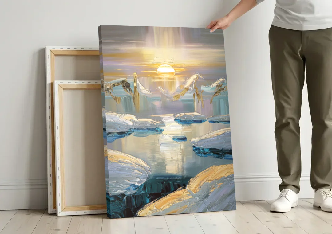 Anchorage Midnight Sun canvas wall art leaning against a wall next to blank canvases