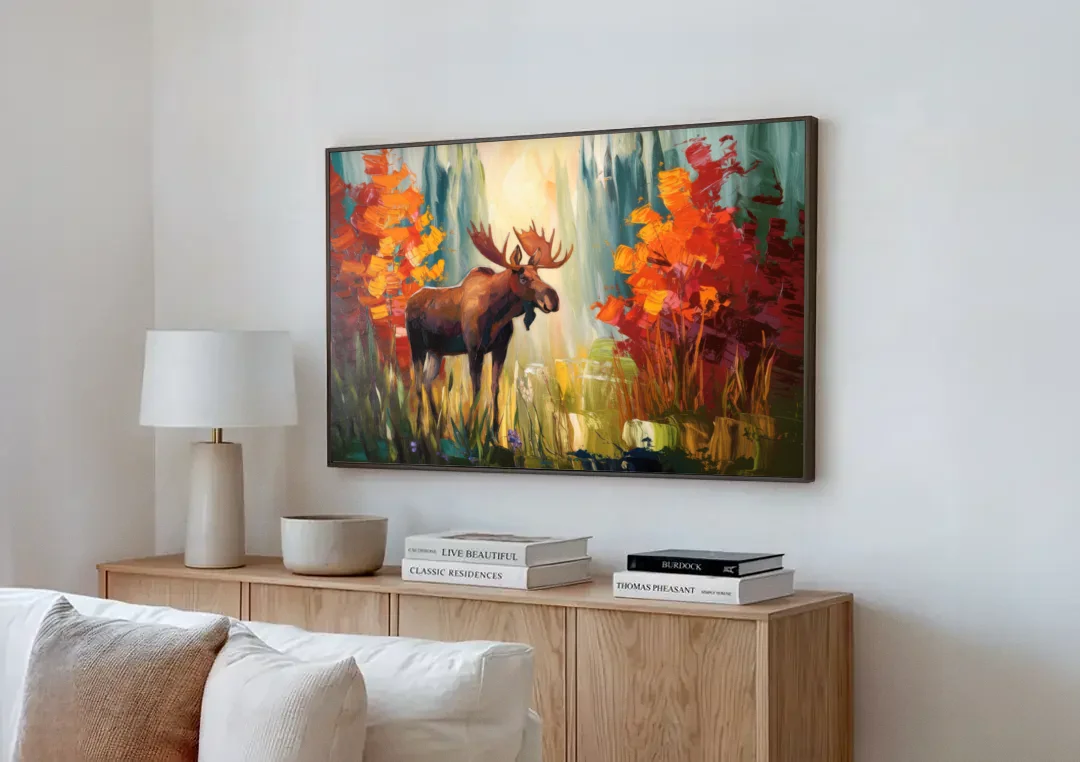 Anchorage Moose In The Wild canvas wall art above a wooden sideboard next to a sofa