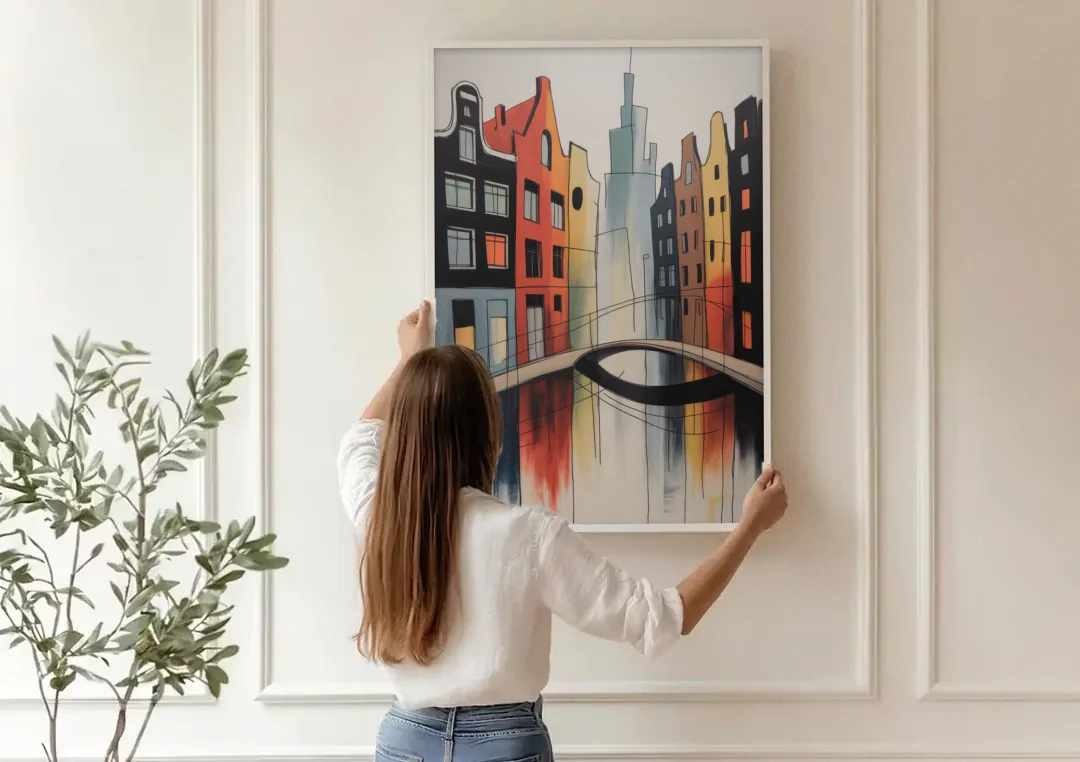 Anne Frank's Amsterdam canvas wall art being hung on a paneled wall