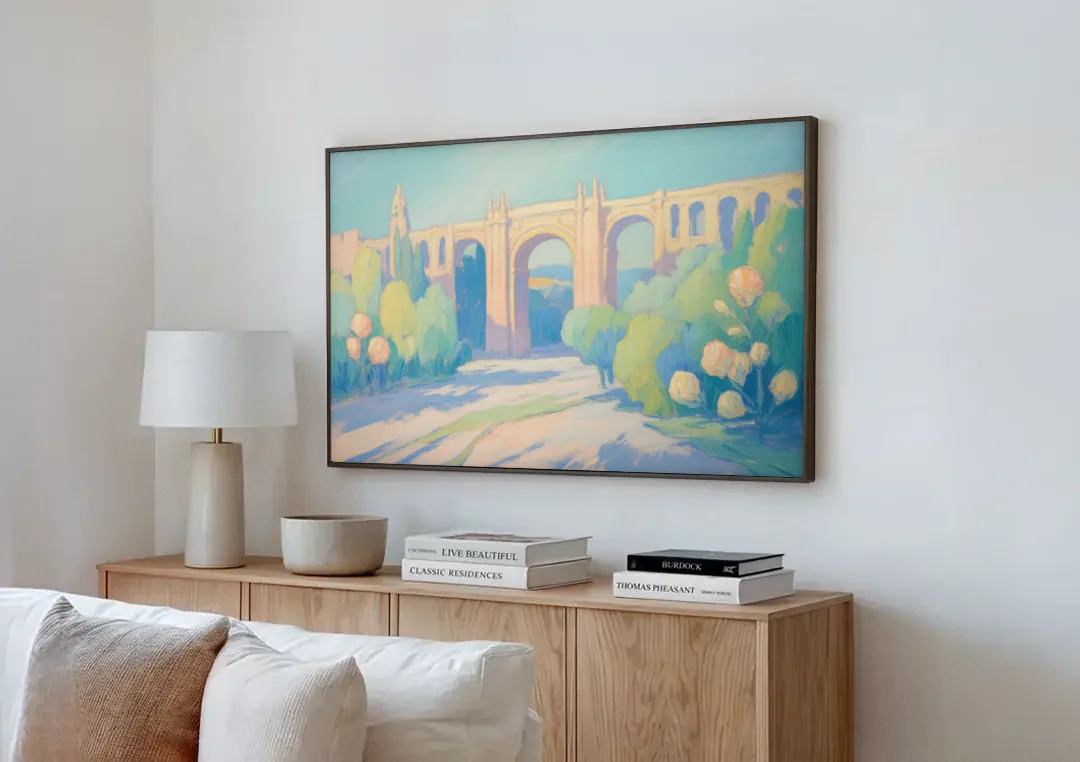 Arcos de Guadalajara canvas wall art above a wooden sideboard next to a sofa