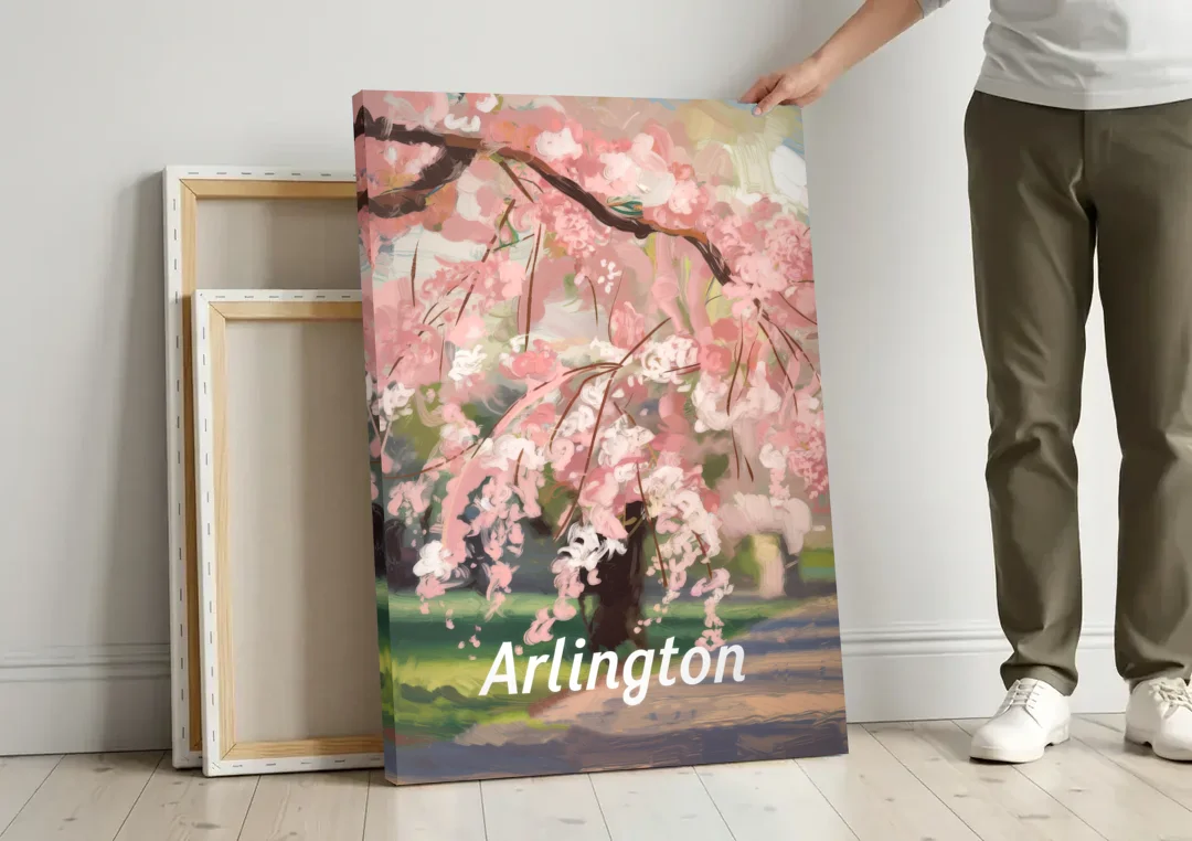 Arlington Cherry Blossoms canvas wall art leaning against a wall next to blank canvases