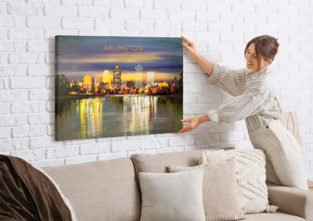 Arlington Cityscape Reflection canvas wall art being hung on a white brick wall above a sofa