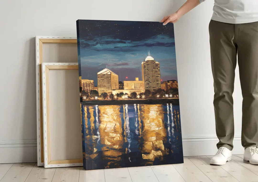 Arlington Night Lights canvas wall art leaning against a wall next to blank canvases