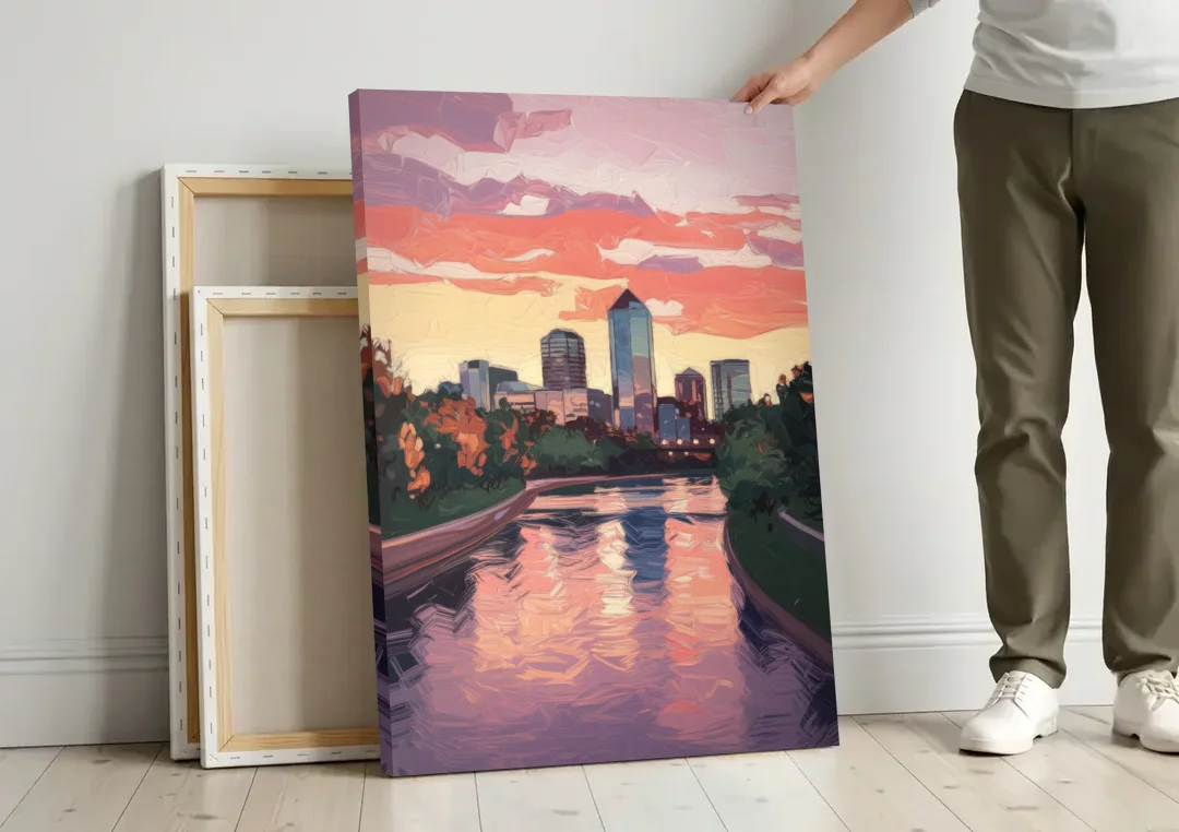Arlington Skyline Sunset canvas wall art leaning against a wall next to blank canvases