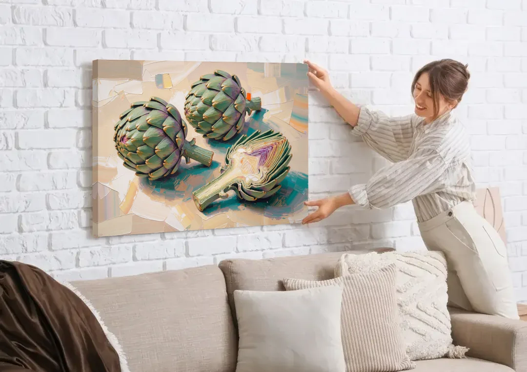 Artichoke Painting with Sliced Heart canvas wall art being hung on a white brick wall above a sofa