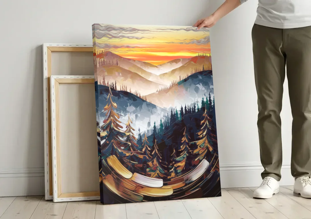 Asheville Blue Ridge Sunset canvas wall art leaning against a wall next to blank canvases