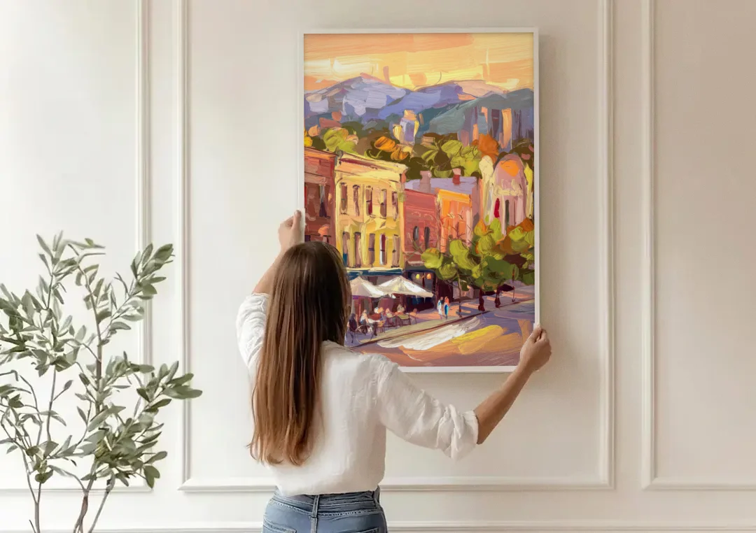 Asheville Downtown Landmarks canvas wall art being hung on a paneled wall