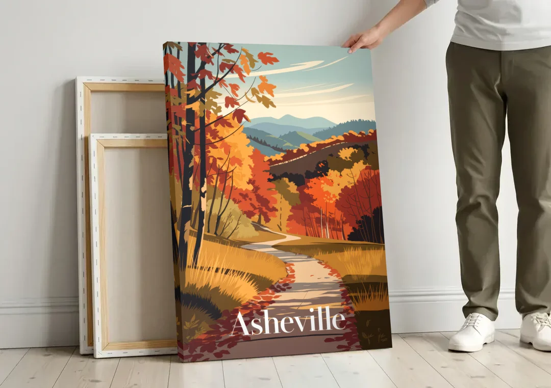 Asheville Fall Foliage Scene canvas wall art leaning against a wall next to blank canvases