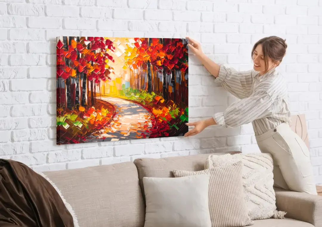 Ashland Autumn Forest canvas wall art being hung on a white brick wall above a sofa