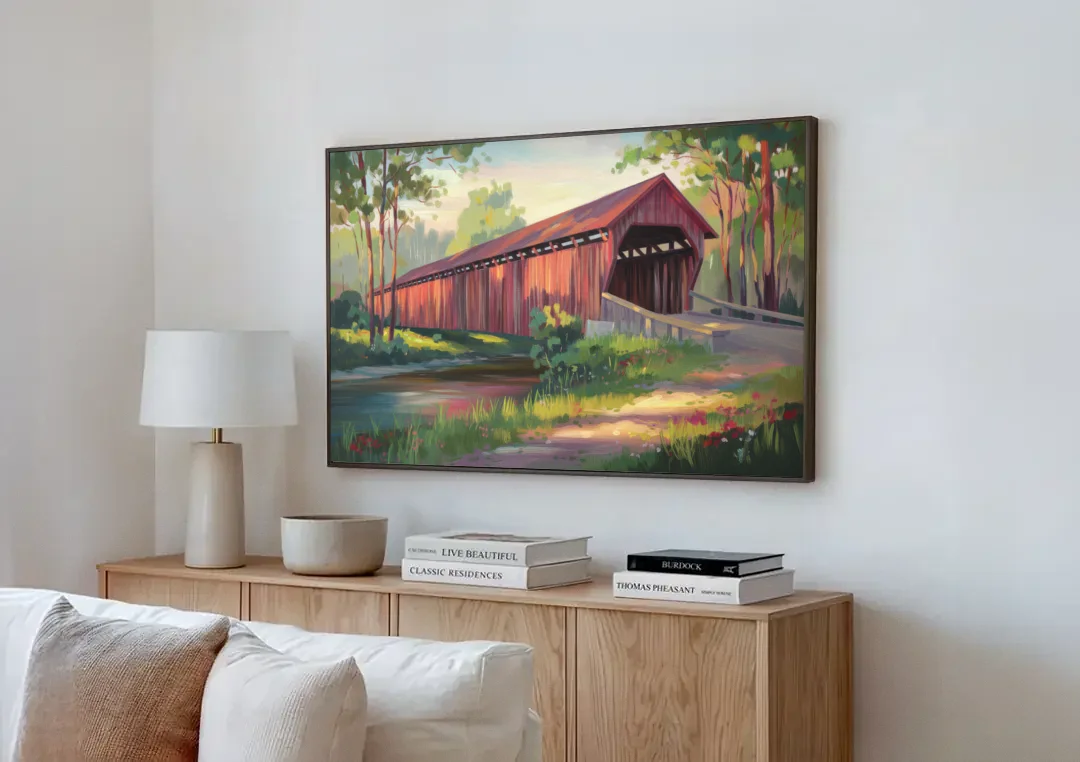 Ashland Covered Bridge canvas wall art above a wooden sideboard next to a sofa