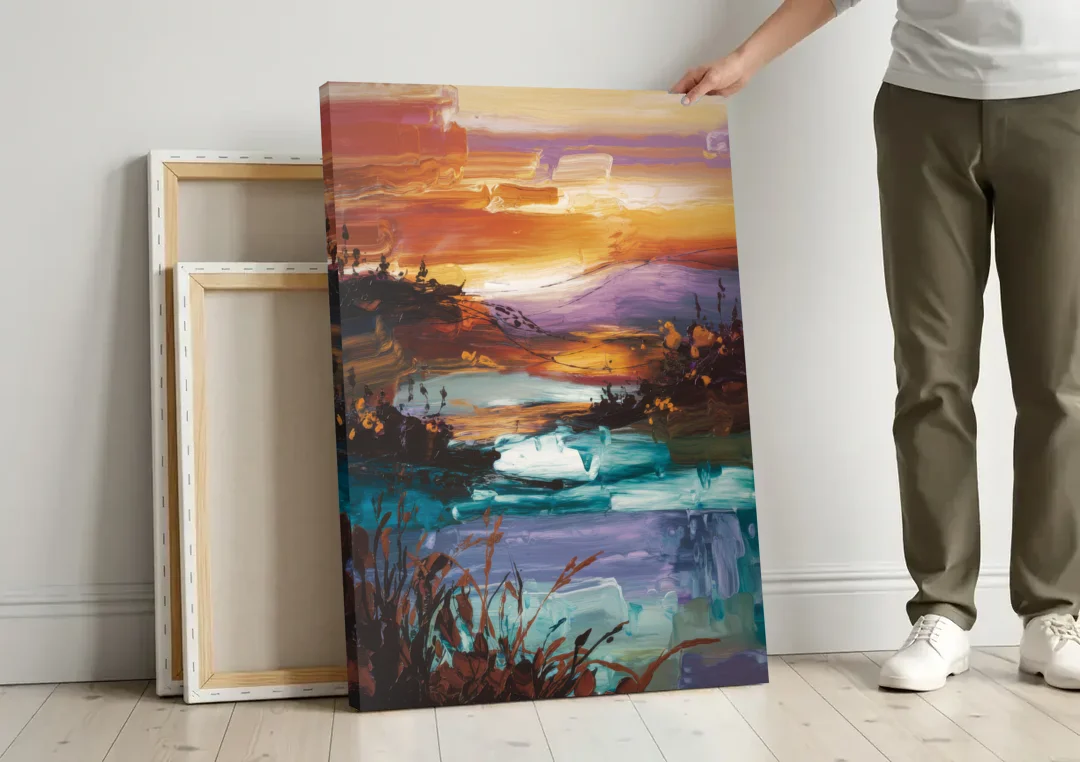 Ashland Evening Glow canvas wall art leaning against a wall next to blank canvases