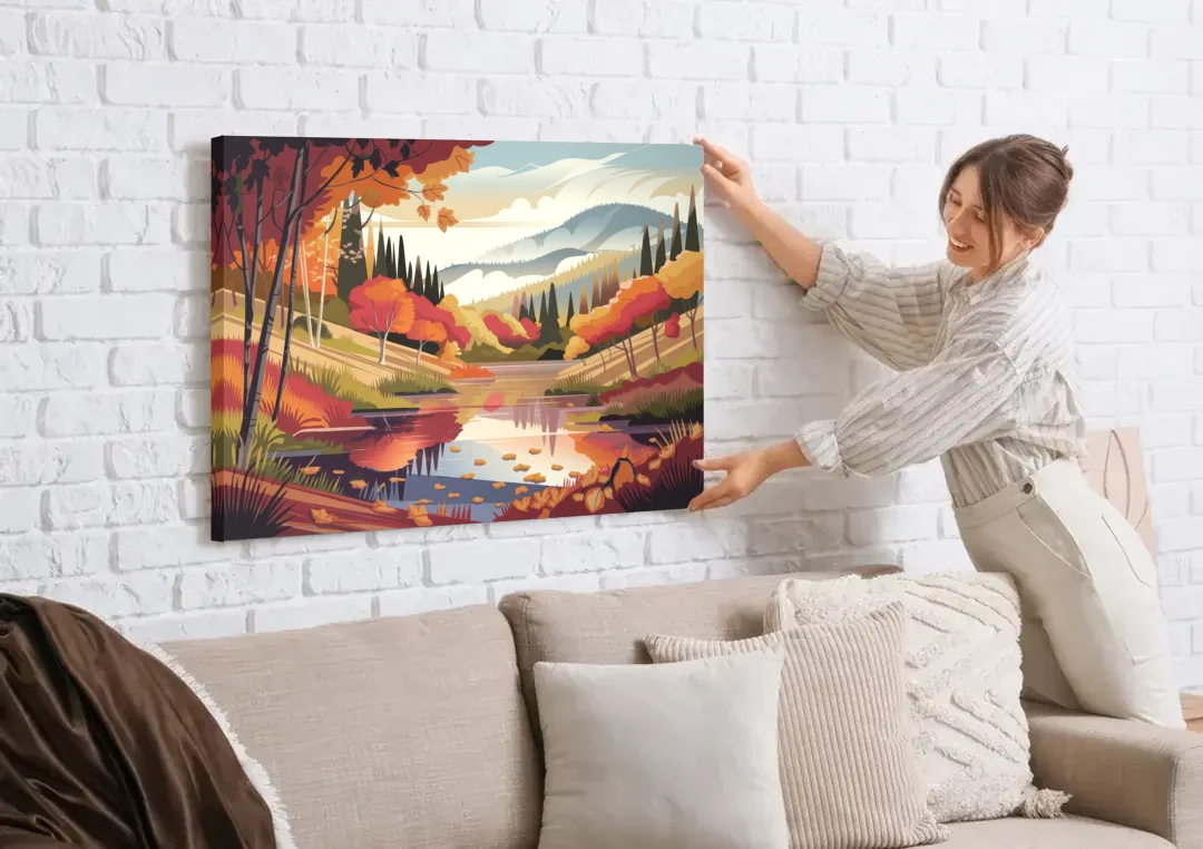Ashland Fall Foliage canvas wall art being hung on a white brick wall above a sofa